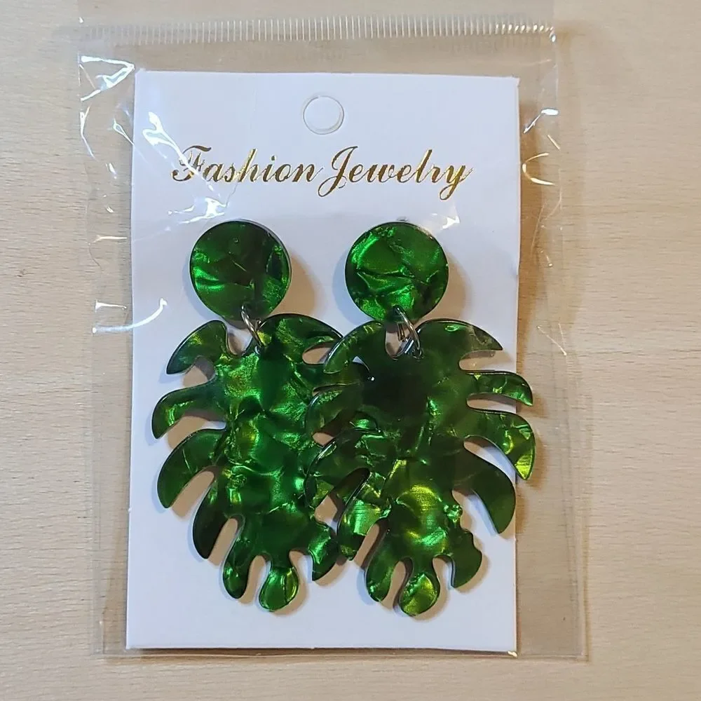 Fashion Jewelry 4 pairs of acrylic gold plated earrings.